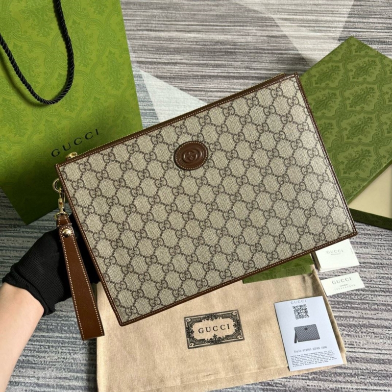 G*u*i clutch bags